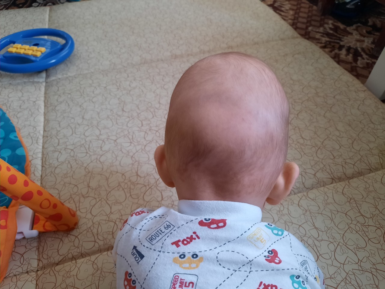 голова ребенка 3 месяца фото